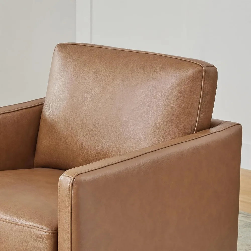 Close-up of a Morsale Genuine Leather Swivel Lounge Chair featuring a modern design with clean lines and a cushioned backrest. Positioned against a neutral wall on a light floor, it adds warmth and coziness to the room. Simple assembly ensures easy enhancement of your space.
