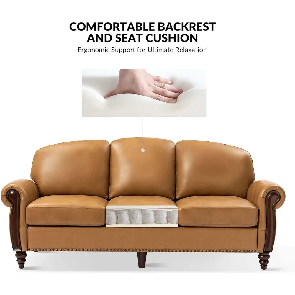 The Morsale Modi Genuine Leather Sofa, a modern three-seater in brown, features a comfortable backrest and soft seat cushions. Its wooden legs and nailhead trim add elegance, as shown by a hand pressing into the cushion to illustrate its ergonomic support.