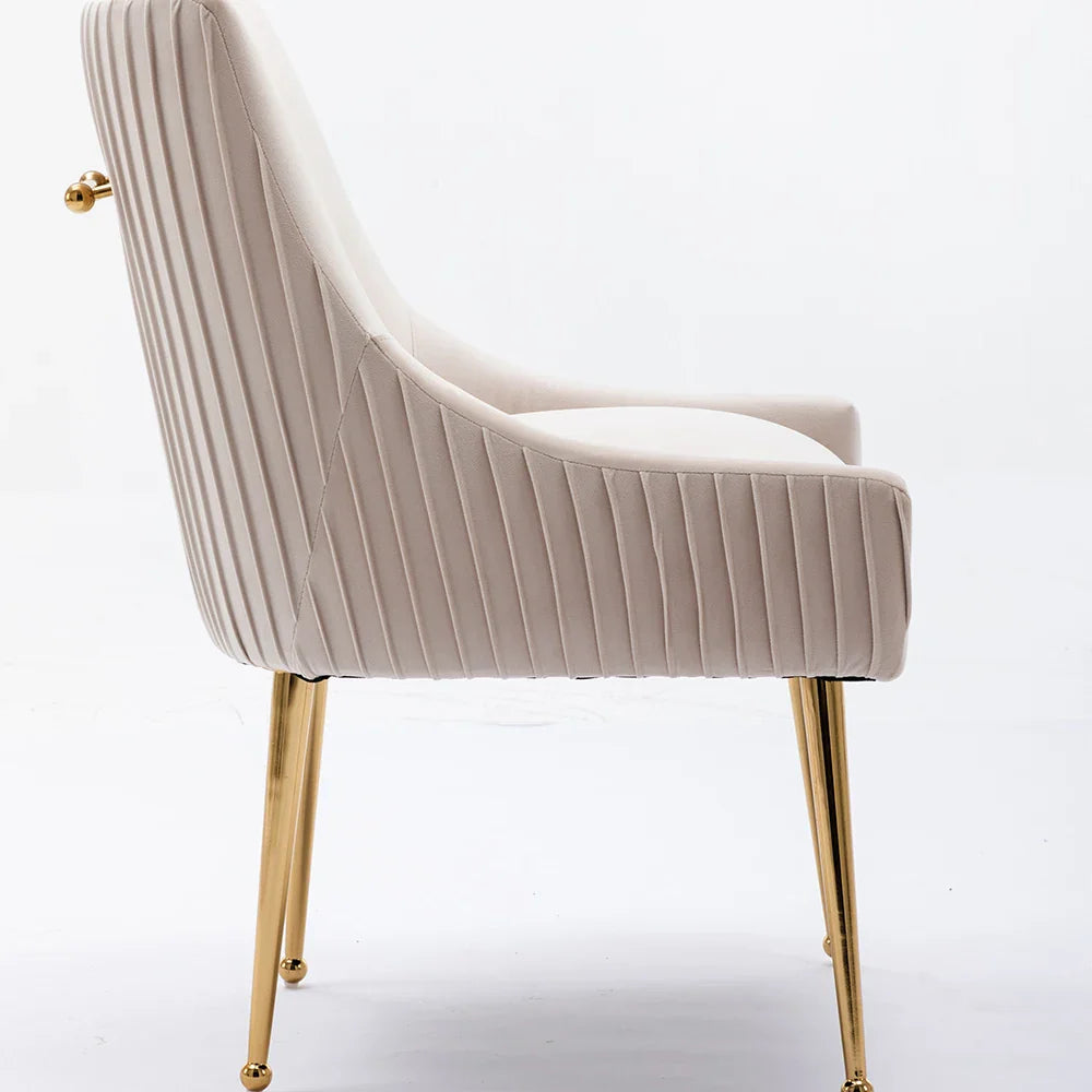 The Morsale Modern Glam Boucle Pleated Velvet Dining Chair Set of 4 features an elegant beige upholstered design with vertical stitching, sleek shiny gold legs, and a gold knob detail on the back, epitomizing exquisite modern home furniture against a plain white backdrop.