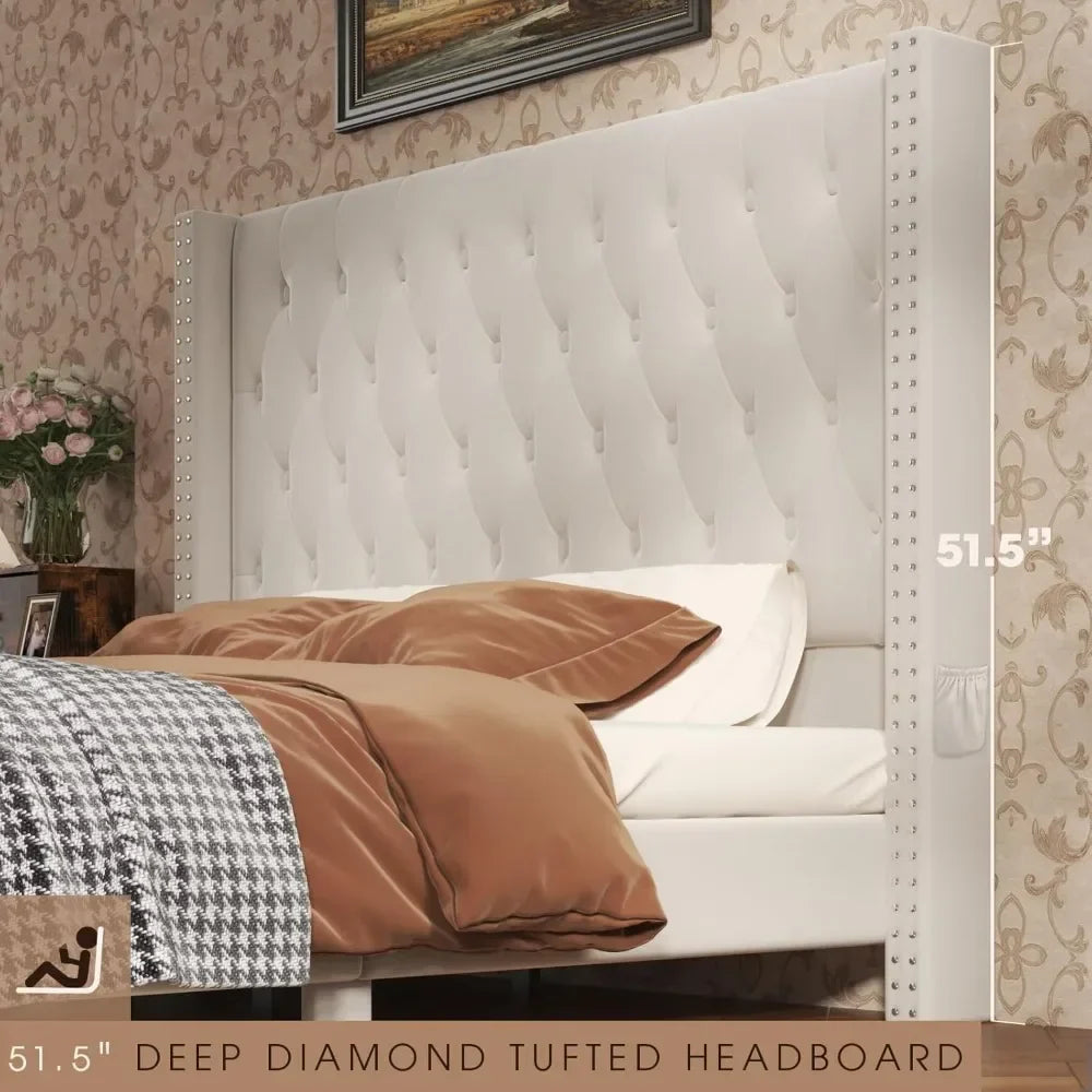 The Gio Velvet Queen Bed with Storage by Morsale features a modern 51.5" white deep diamond-tufted headboard in an elegant bedroom scene. It is adorned with brown and cotton white bedding, highlighted by a grey patterned blanket, all set against floral wallpaper that enhances the ambiance.