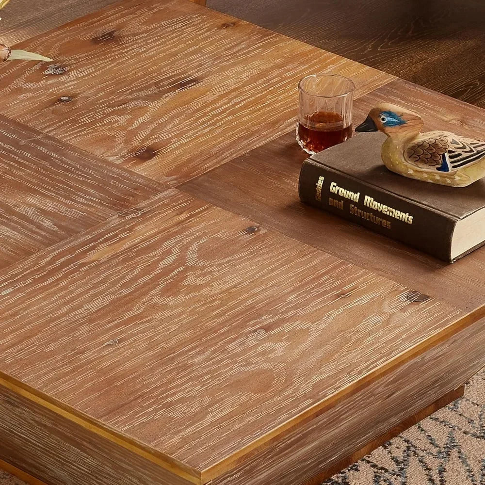 A decorative scene with a glass of brown liquid, a small ceramic duck, and two books including "Ground Movements and Structures" rests on Morsale's Lift Top Farmhouse Coffee Table. A patterned rug peeks out from beneath the cozy setup.