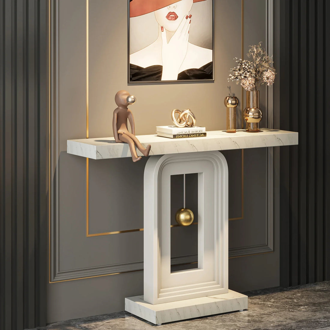 A chic, modern entryway features the Westford Contemporary Entryway Table by Morsale, highlighted by a gold pendulum accent. Decorative plants and gold figurines sit on top, while a wavy-edged mirror hangs above the minimalist teal wall. A potted plant and sleek wooden accents complete the look.
